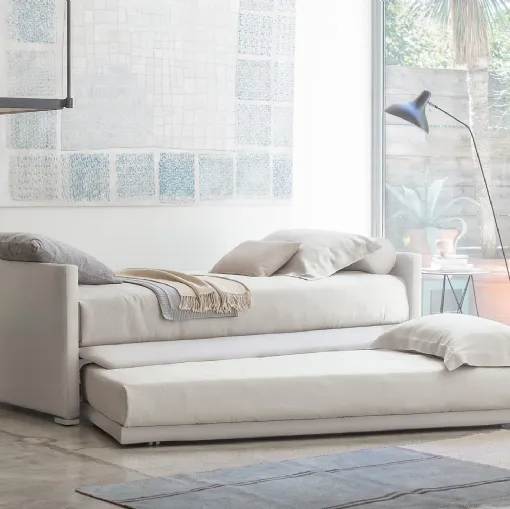 Letto singolo che nasconde sotto la base un secondo letto di servizio, Biss di Flou